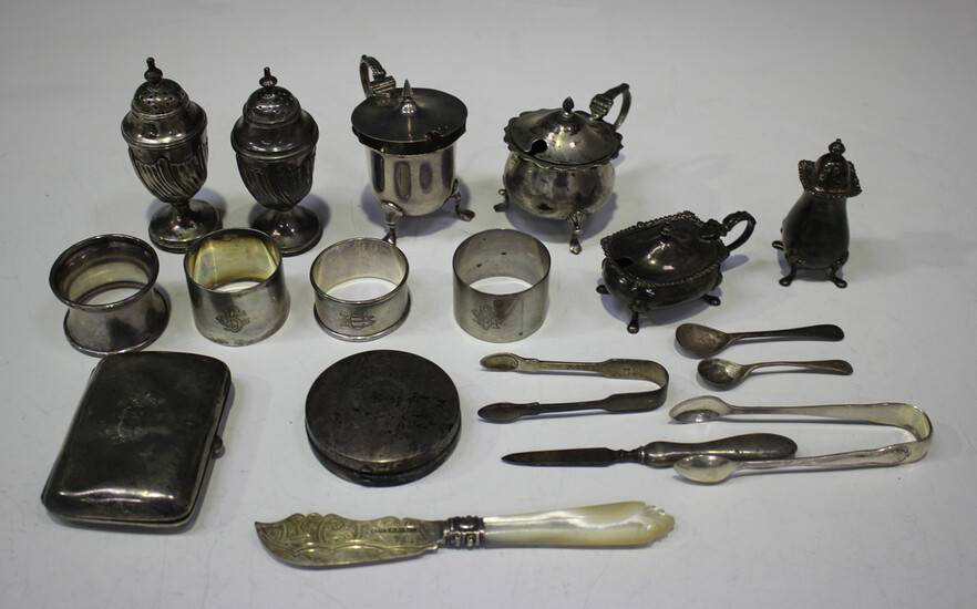 A collection of silver items, including a pair of late Victorian silver pepper casters of half spira
