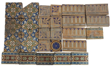A collection of various Victorian encaustic tiles