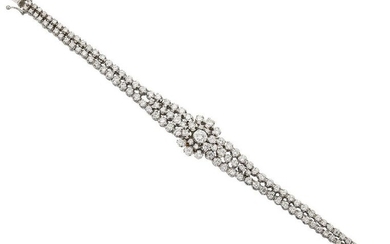 A diamond bracelet, the central cluster with triple...