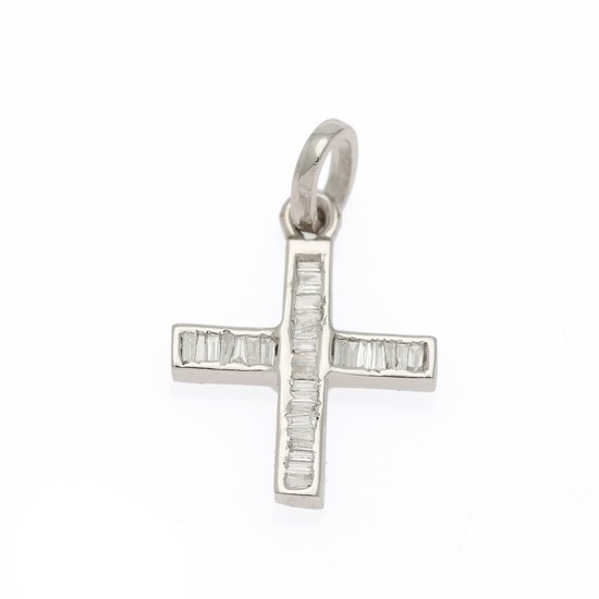 A diamond pendant in shape of a cross set with numerous baguette-cut and trapez-cut diamonds, mounted in 14k white gold.