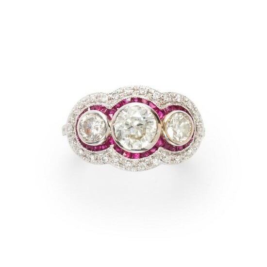 A diamond, ruby and eighteen karat white gold ring