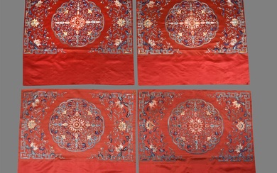 A fine set of four Chinese red silk table frontals
