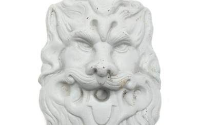 A grey painted cast iron lion head wall plaque for fountaine. C....
