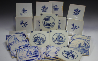 A group of approximately sixty Dutch Delft blue and white tiles, late 19th/early 20th century, inclu