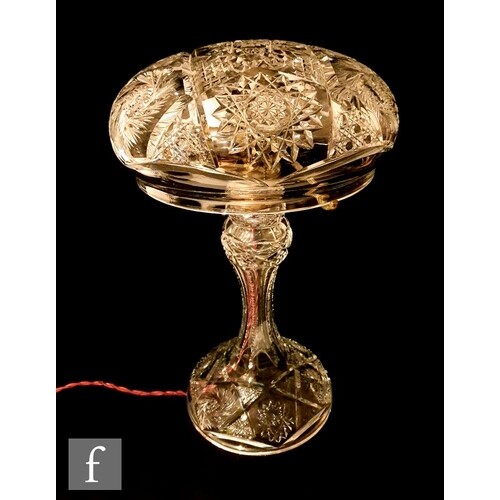 A large 1930s cut glass mushroom table lamp, the inverted ci...