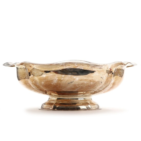 A large 20th century sterling silver centerpiece with hammered surface. Marked T. F. Weight app. 2048 gr. H. 16.5. L. 49.5 cm.