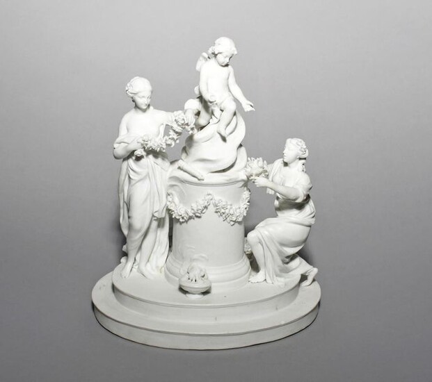 A large French bisque porcelain figure group of...