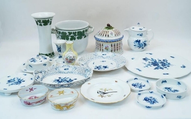 A large group of Meissen porcelain, 19th and 20th centuries, blue underglaze crossed swords marks, to include: a circular basket dish with cover, with conker finial, the dish and cover with openwork panelling and four inset ovals containing floral...