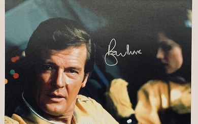 SOLD. A large signed colour still photograph of the English actor Sir Roger Moore – Bruun Rasmussen Auctioneers of Fine Art