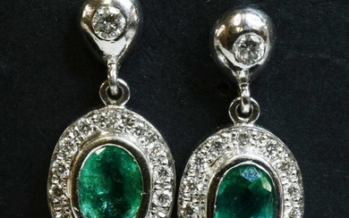 A pair of 18ct white gold emerald and diamond cluster drop earrings