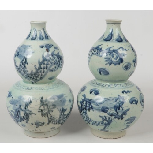 A pair of 20th century Chinese blue and white double gourd v...