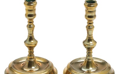 A pair of Danish 20th century brass candlestick holders, baluster-shaped stems on...