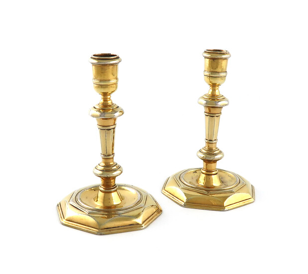 A pair of George II Irish silver-gilt candlesticks