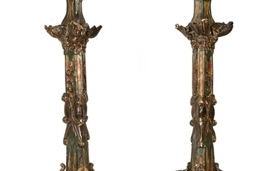 A pair of Italian carved and polychromed wood torches...