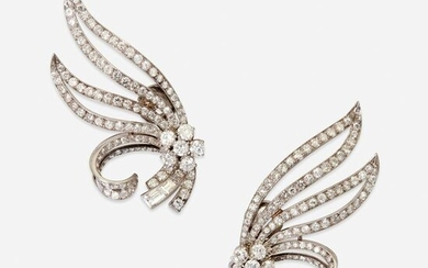 A pair of diamond and platinum earclips, Mellerio