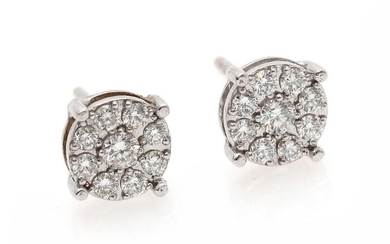 SOLD. A pair of diamond ear studs each set with numerous brilliant-cut diamonds weighing a total of app. 0.52 ct., mounted in 18k white gold. (2) – Bruun Rasmussen Auctioneers of Fine Art