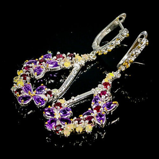A pair of ear pendants each set with numerous circular-cut and pear shaped amethysts, opals and rhodolite garnets, mounted in rhodium plated sterling silver.