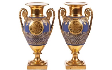 A pair of late 19th-century French pedestal vases, (possibly Paris Porcelain), gilt decorated on a