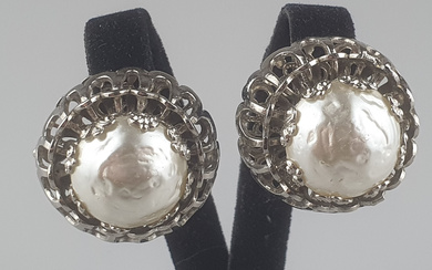 A pair of massive heavy vintage ear clips.