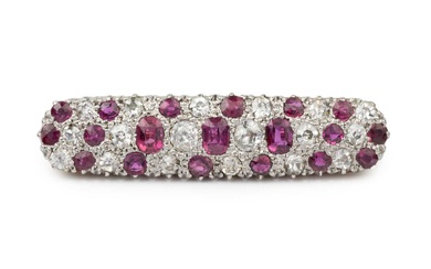 A ruby and diamond panel brooch, of slightly bowed and...