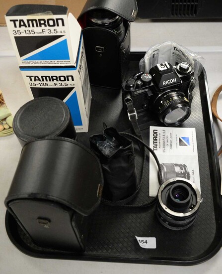 A selection of camera accessories and a camera