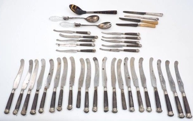 A set of 18th century knives with silver mounted wooden handles, comprising 21 table knives and 10 dessert knives, several of the smaller knives stamped 'SHEMEL' to blades, all unmarked, some damage, together with a tortoiseshell serving spoon; a...