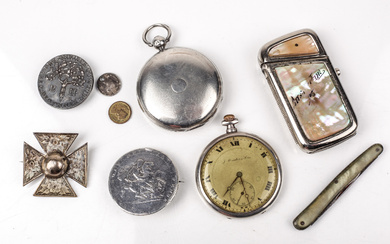 A small collection silver and metal items.