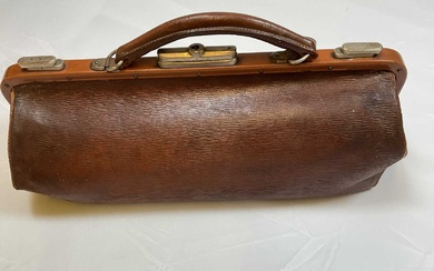 A small vintage leather 'Gladstone' bag complete with key, length...