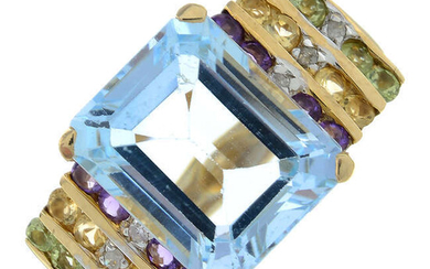 A topaz and gem-set dress ring.