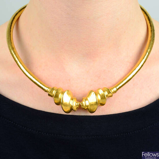 A toque necklace with shell motif terminals, by Ilias Lalaounis.
