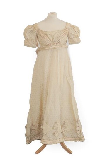 A19th Century Cream Silk Short Sleeve Dress woven with leaves, military style cream silk straps and