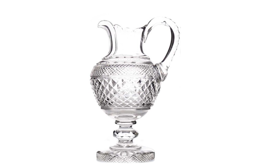 AN EARLY 19TH CENTURY CUT GLASS CLARET JUG