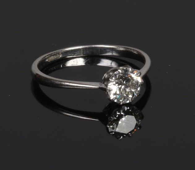 An 18 carat white gold solitaire diamond ring, old European ...