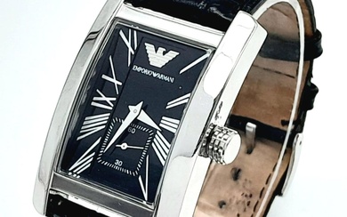 An Armani Designer Quartz Gents Watch. Black leather strap....