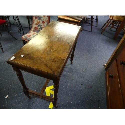 An Edwardian walnut and mahogany Games Table, the quarter ve...