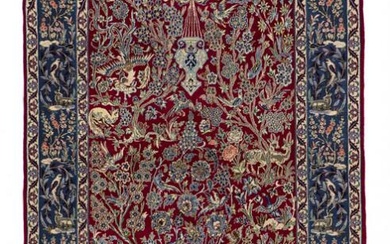 An Isfahan rug, Persia. Design with flowervase and hanging oil lamp. Knotted...