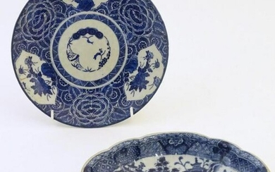 An Oriental blue and white plate with stylised peony