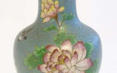An Oriental cloisonne baluster vase decorated with
