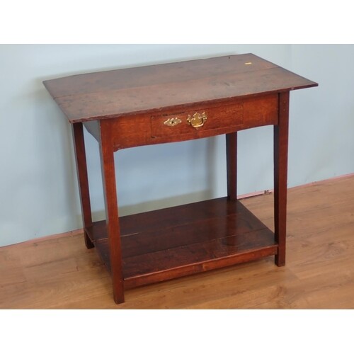 An antique oak Side Table with two plank top, fitted frieze ...