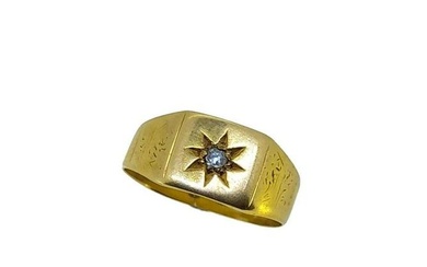 An early 20th century 18ct gold diamond set signet ring, rectangular head with a star set old cut