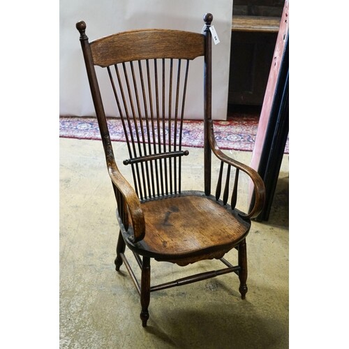 An early 20th century American ash and oak elbow chair, widt...