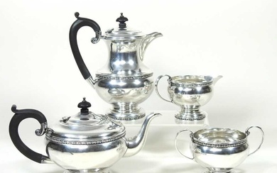 An early 20th century silver four piece tea service, of...
