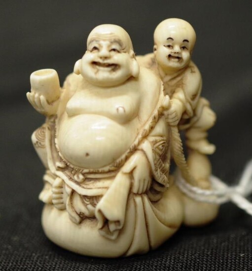 Antique Japanese ivory Buddha & child netsuke circa 1920,...