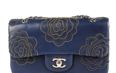 CHANEL - a beaded Camellia Flap handbag. Crafted from