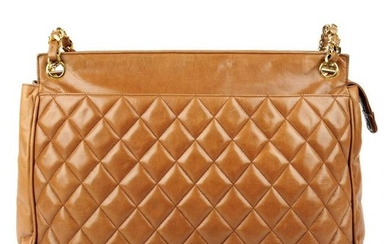 CHANEL - a vintage tan quilted leather handbag. Crafted