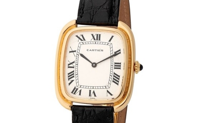 Cartier Paris. Attractive and Fine Ceinture Oversize Oval-Shape Wristwatch in Yellow Gold, With Roman Numbers Dial