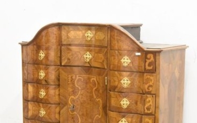 Crossbow-shaped cabinet with 15 drawers and a central...