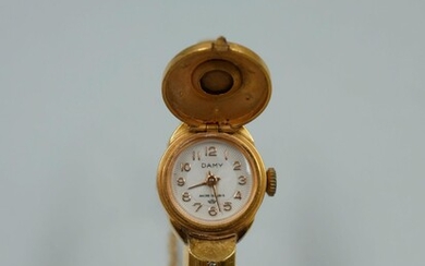 DAMY. Montre bracelet de dame en métal doré,... - Lot 54 - Copages Auction Paris