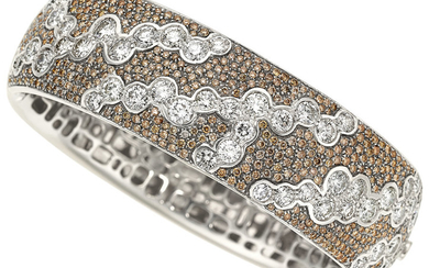 Diamond, Colored Diamond, Gold Bracelet The hinged bangle features...