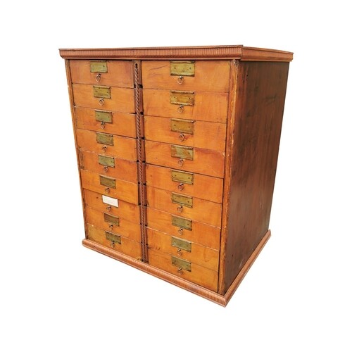 Early 20th C. stained pine bank of eighteen drawers with ori...
